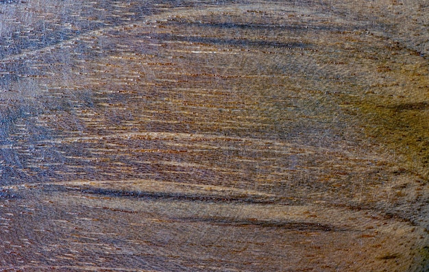 Темно-коричневая поверхность фона текстуры древесины с естественным рисунком.