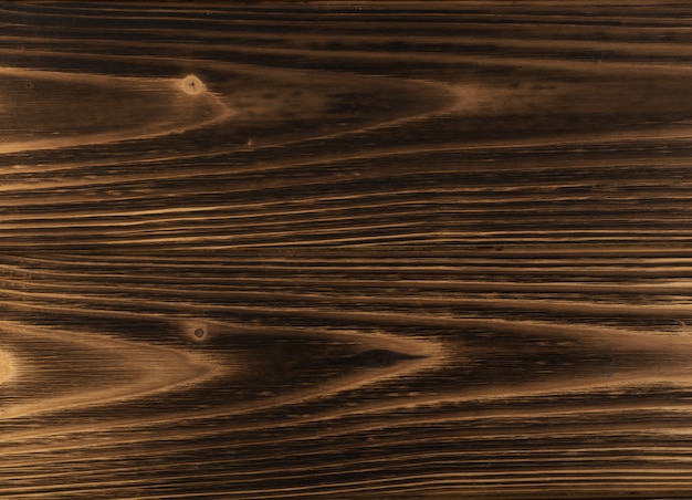 Dark burnt wood background