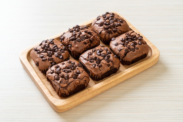 dark chocolate brownies with chocolate chips on top