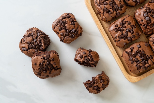 dark chocolate brownies with chocolate chips on top