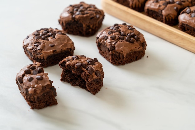 dark chocolate brownies with chocolate chips on top