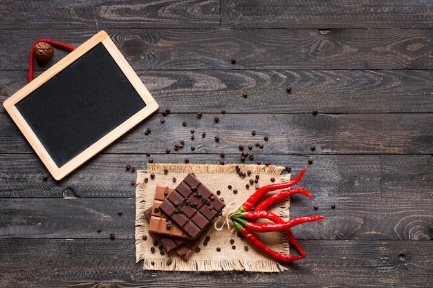 Dark chocolate and milk chocolate, with red hot chili peppers