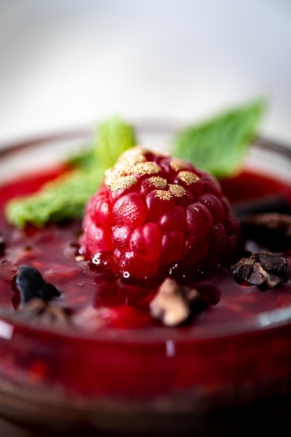 Dark Chocolate Mousse Pudding with Raspberries.