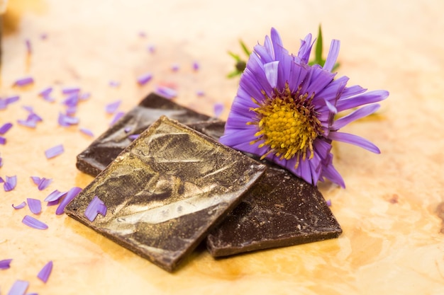 Dark chocolate on a wooden table