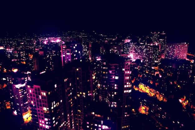 Dark cityscape with beautiful neon lights Modern metropolis