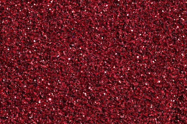 Dark crimson background with glitter for your project