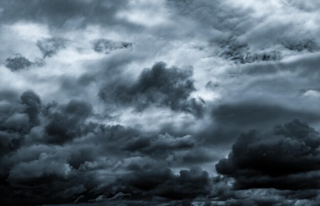 Dark dramatic sky and clouds background for death and sad concept gray sky and fluffy clouds