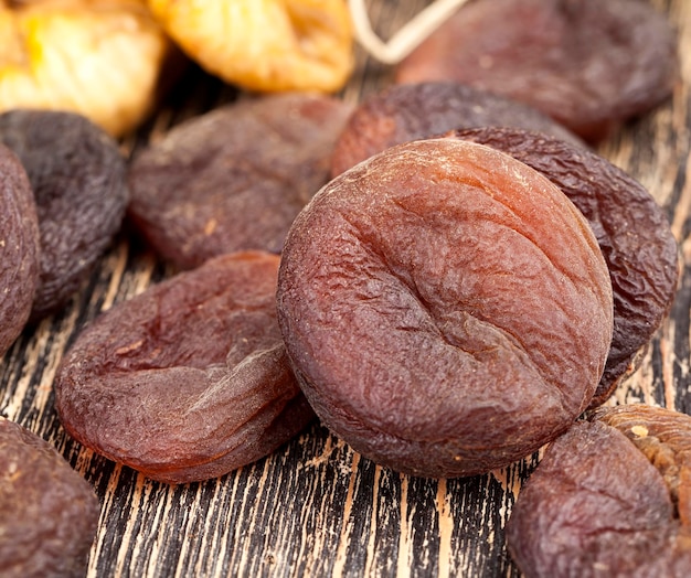 Dark dried apricots of large size