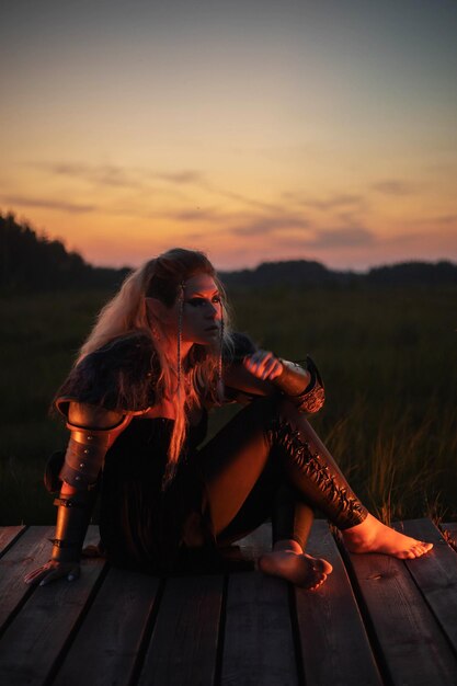 Photo dark elf girl at sunset