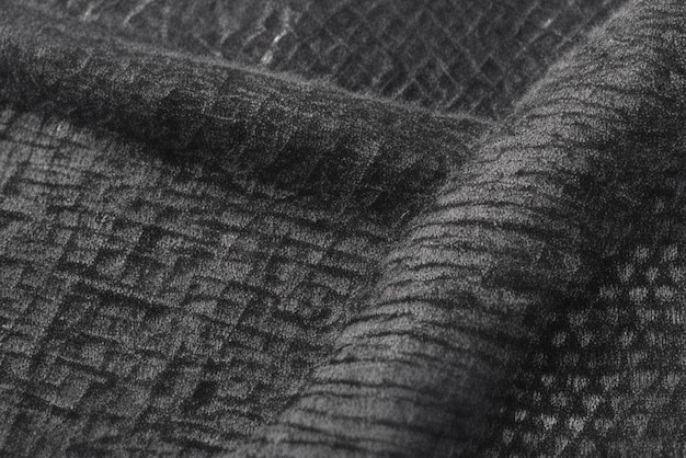 Фото Темный рисунок ткани с изношенной текстурой и нерегулярностями