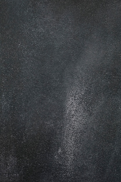 Dark gray rough concrete background