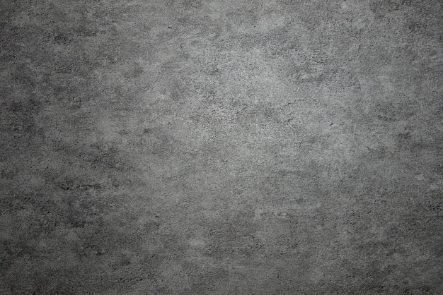 Photo dark gray stone background.