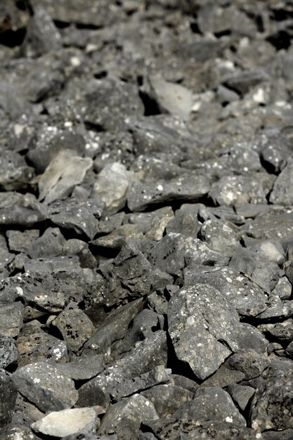 Dark gray stones rough texture