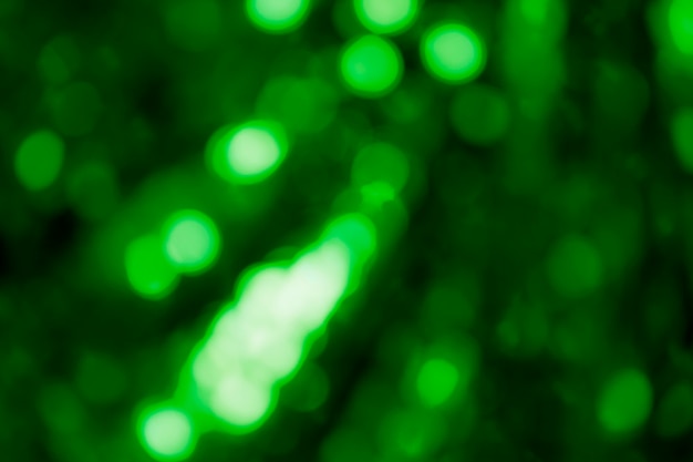 Dark green bokeh patterned background