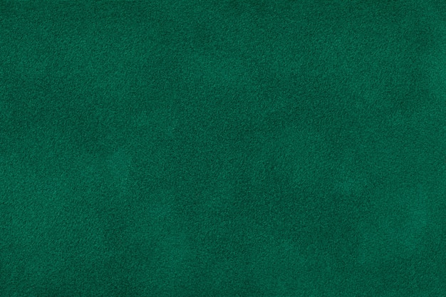 Photo dark green matt suede fabric  velvet texture,