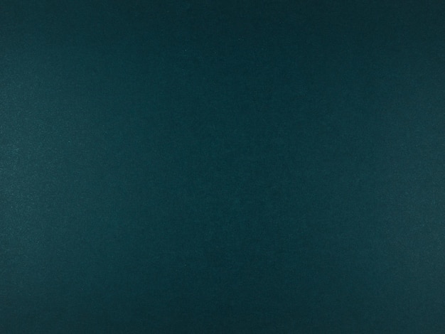 Dark green paper abstract background