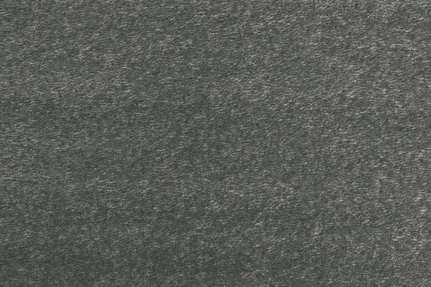 Dark grey background texture of the foam