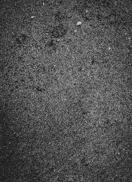 Foto sfondo nero grigio scuro o sfondo bianco e nero di roccia di texturegranite