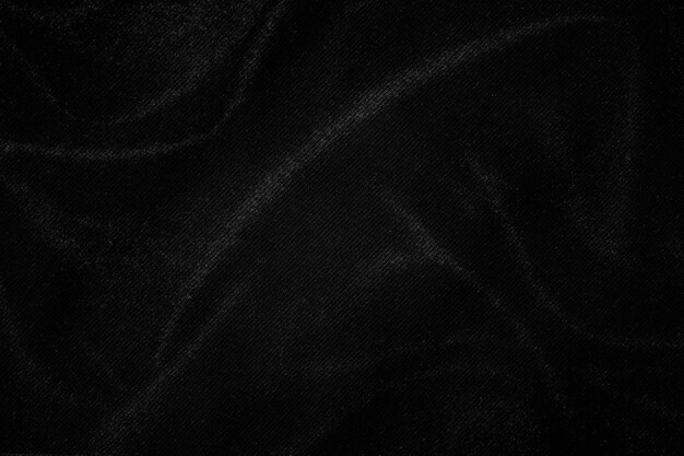 Dark grey wrinkled fabric texture background