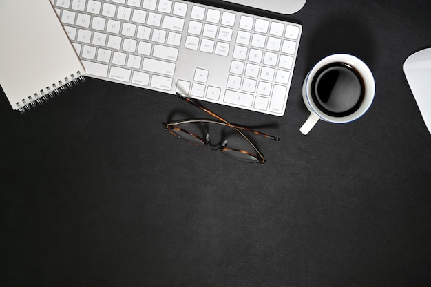 Dark leather workspace  and office gadget