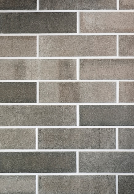 Dark and light grey bricks wall