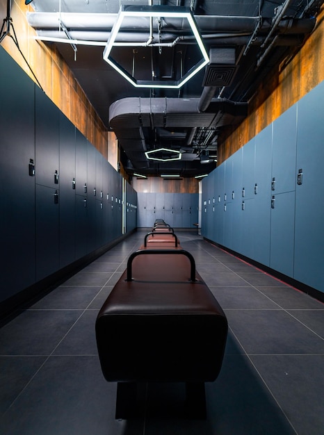 Dark lockers in a changing room Modern locker room gym interior Luxury and very clean dressing room in European style