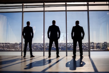 Silhouette Of Man Against Window by Stocksy Contributor