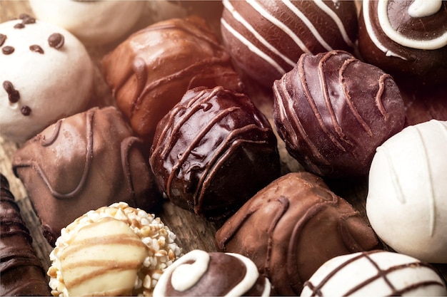 Photo dark, milk and white chocolate candies , pralines , truffles, assorted