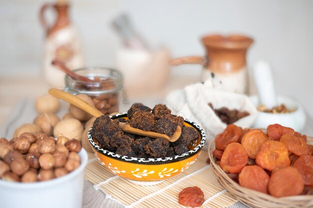 Dark muscovado cane sugar in a bowl selective focus