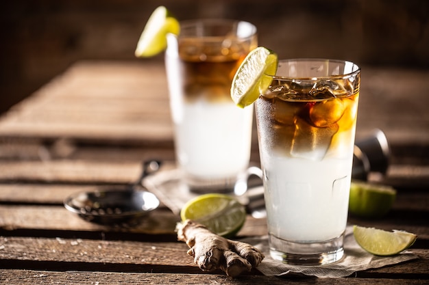 Dark n Stormy highball cocktail served as a long drink with rum, fresh lime juice, and ginger beer.