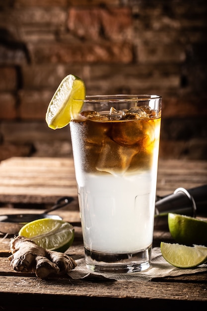 Dark n Stormy highball cocktail served as a long drink with rum, fresh lime juice, and ginger beer.