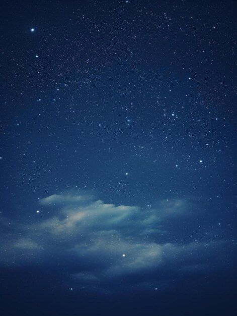 暗い夜空と雲と星の青い空