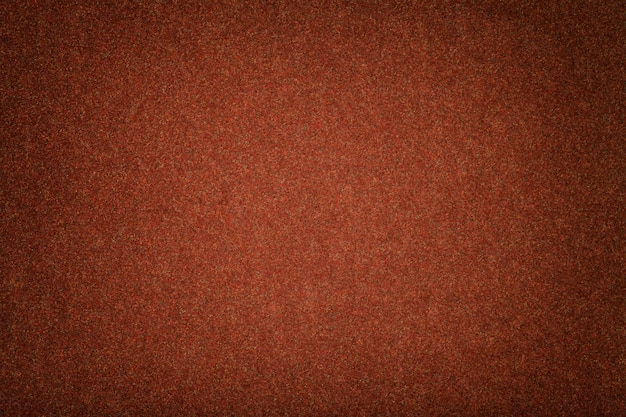 Dark orange matt suede fabric Velvet texture of felt,