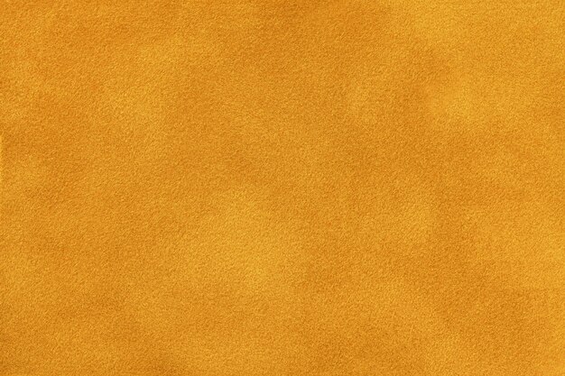 Photo dark orange matte suede fabric