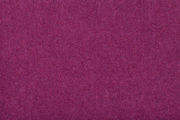 Dark purple matt suede fabric closeup