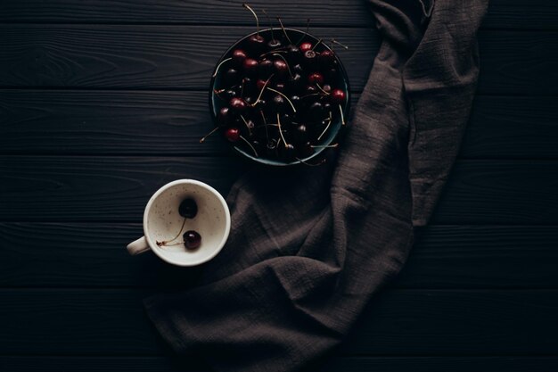 Dark red cherries on a wooden table