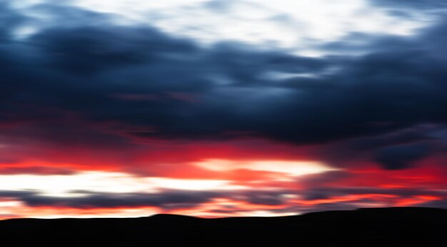 Dark red clouds bokeh background hd