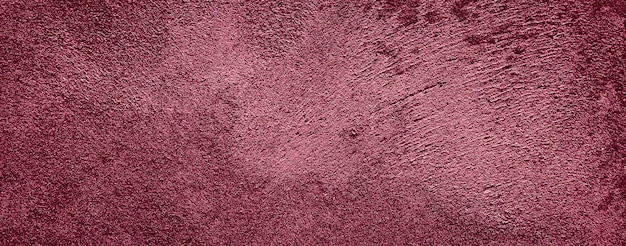 濃い赤の汚れた抽象的なテクスチャセメントコンクリート壁の背景