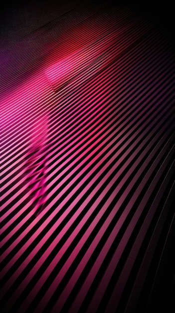 a dark room with a pink light shining on a striped floor