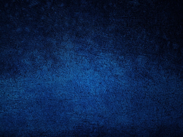 Dark rough cement wall background for graphic design or wallpaper