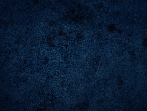 Dark rough cement wall background for graphic design or wallpaper