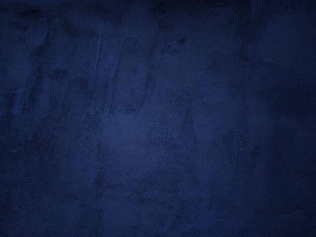 Photo dark rough cement wall background for graphic design