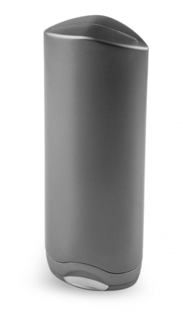 Photo dark shampoo bottle on the white table
