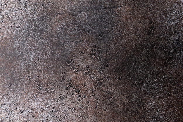 Photo dark stone texture with many holes on, like a moon surface, full frame, copy space