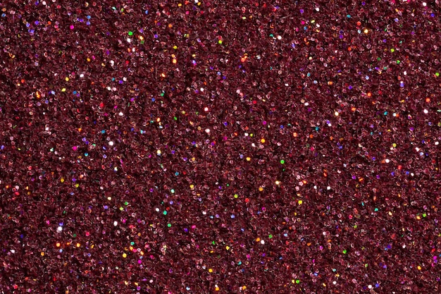 Dark violet red gletter background with colour spangles