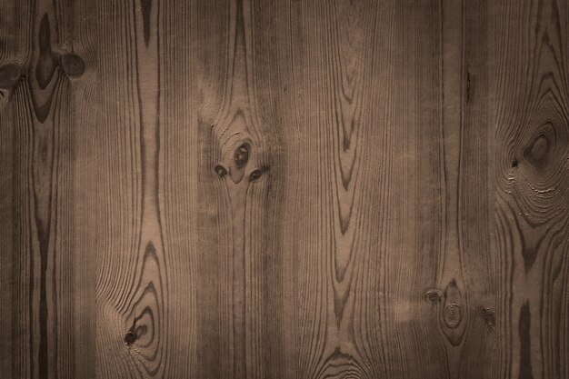 Dark wall of a wooden table