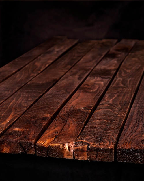 Dark wood table, brown wooden surface 