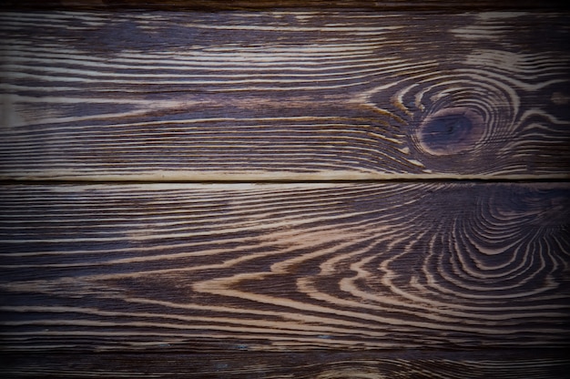 Dark wooden table flat top view background texture