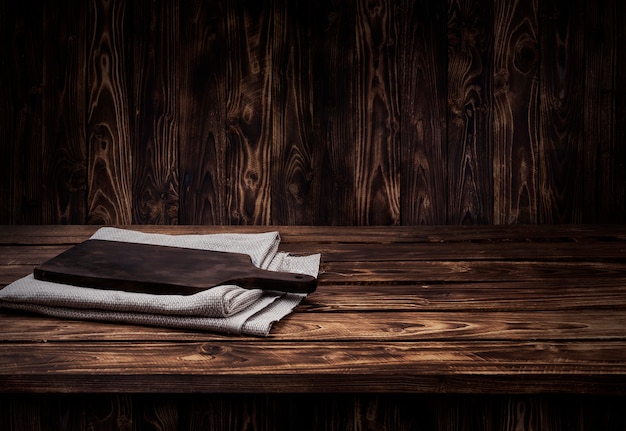 Photo dark wooden table for product