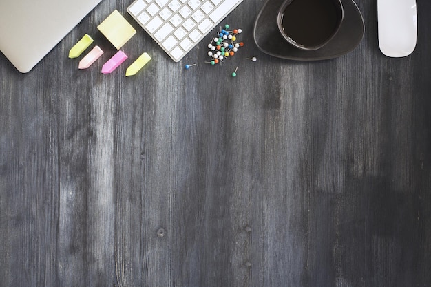 Dark wooden table with items